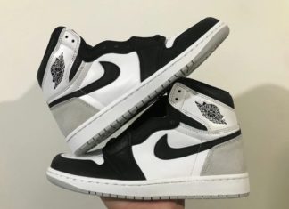 手拿着看Air Jordan 1 High OG“舞台烟雾”