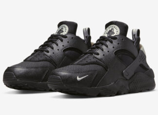 全黑的Nike Air Huarache与Swoosh品牌的标签