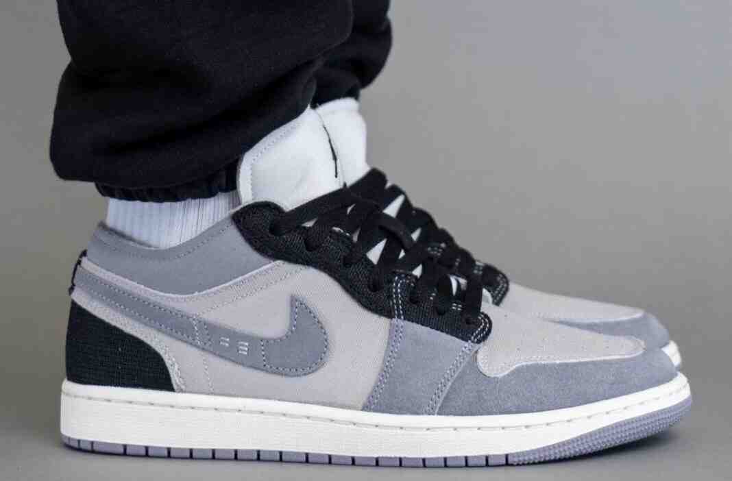 Air Jordan 1 Low Craft “Cement Grey “的脚下照片