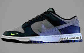 灰色麂皮绒的Nike Dunk Low Surface，带有Volt品牌。